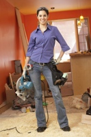 Photo of woman doing home repair